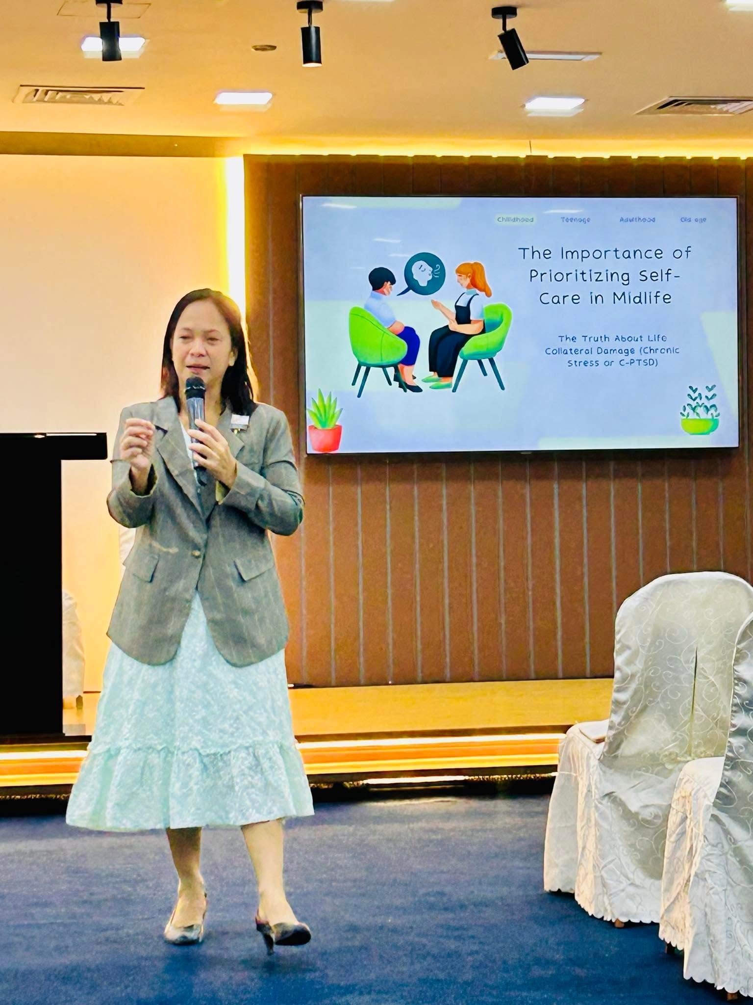 Ruth Magdato presenting on the importance of prioritizing self-care